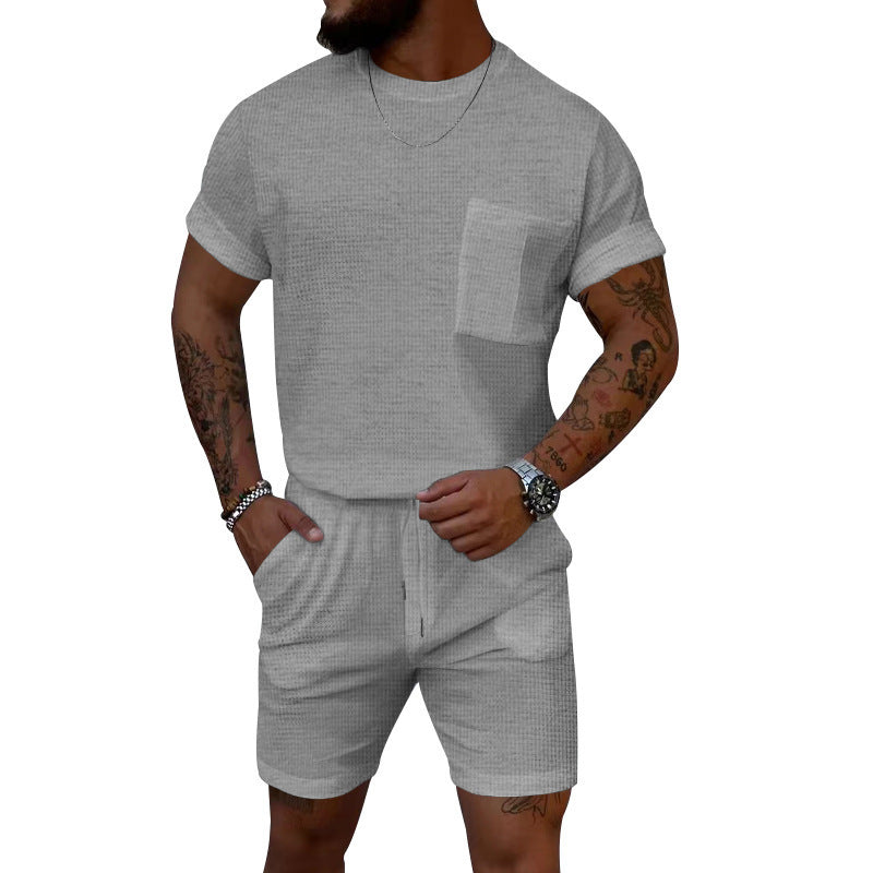 Pantaloncini a maniche corte con scollo rotondo e tasca a nido d'ape, tuta sportiva casual