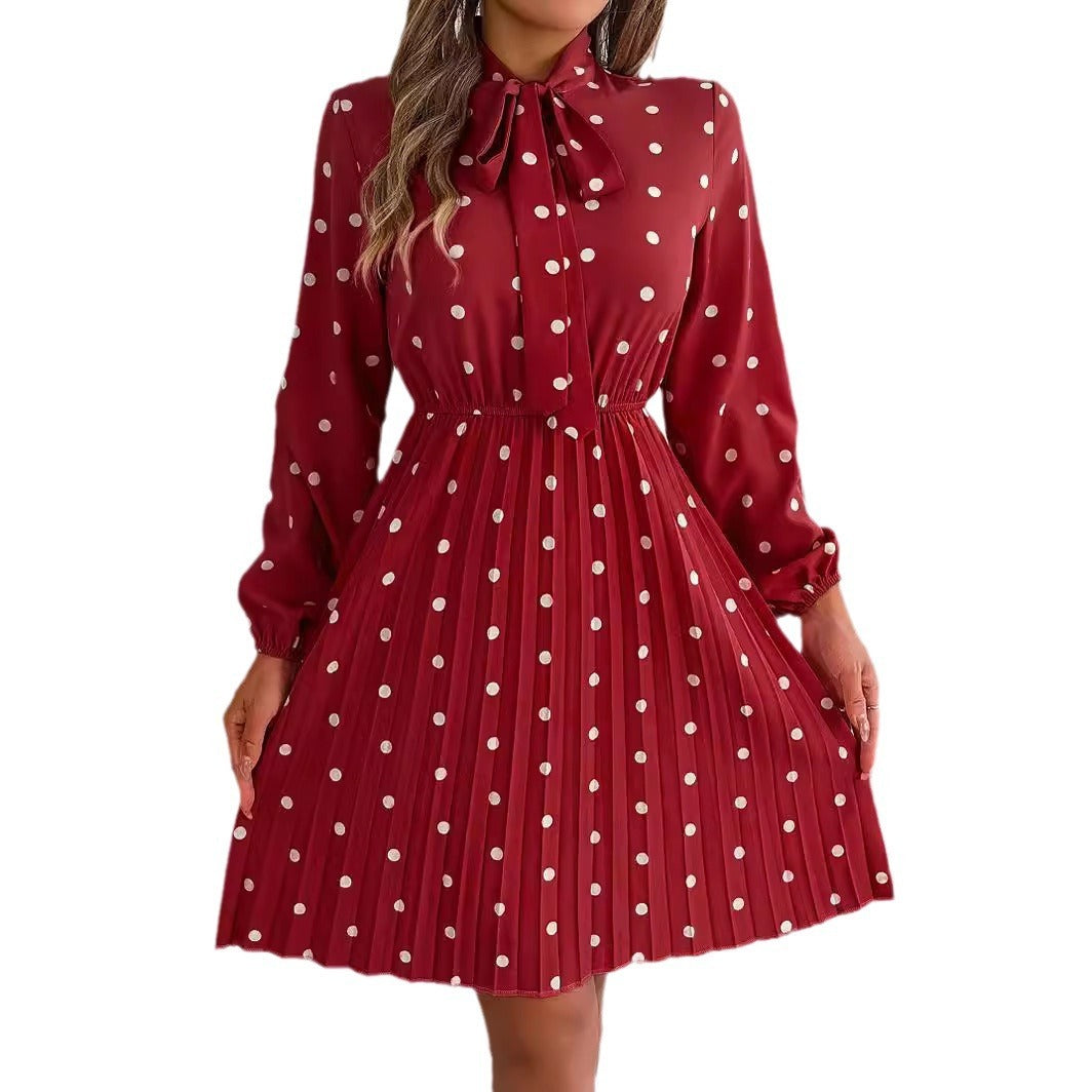 Gonna plissettata a maniche lunghe con cintura regolabile a pois da donna