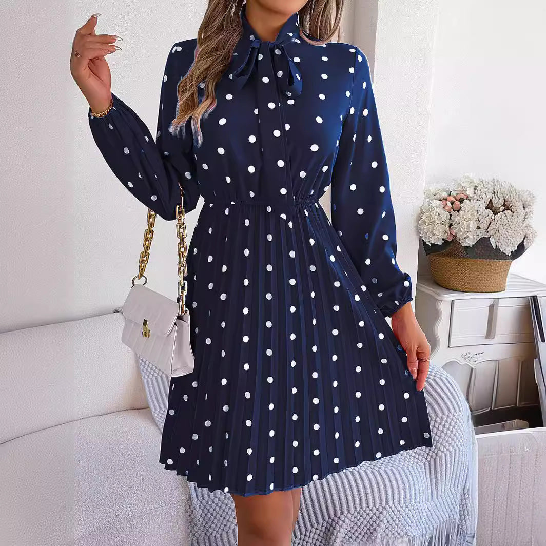 Gonna plissettata a maniche lunghe con cintura regolabile a pois da donna