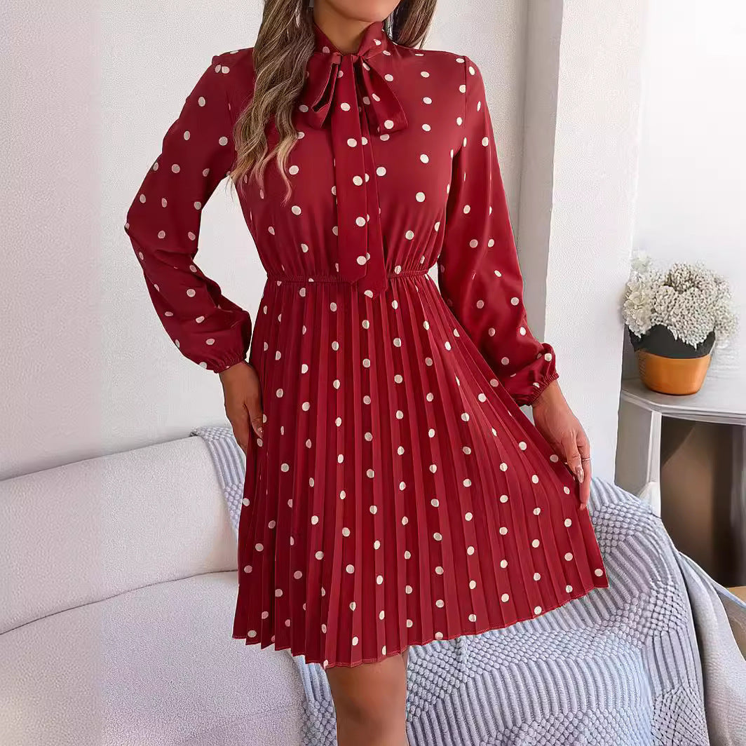 Gonna plissettata a maniche lunghe con cintura regolabile a pois da donna