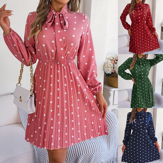 Gonna plissettata a maniche lunghe con cintura regolabile a pois da donna