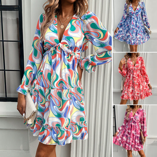 Abito stampato a maniche lunghe con scollo a V in stile vacanze primaverili ed estive